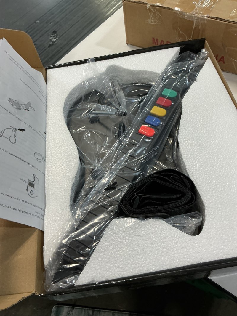 Condition photo showing New/Like New for atuten wireless guitar compatible for wii, supports for rock band games and guitar hero.?rock band 1 is not supported??black?