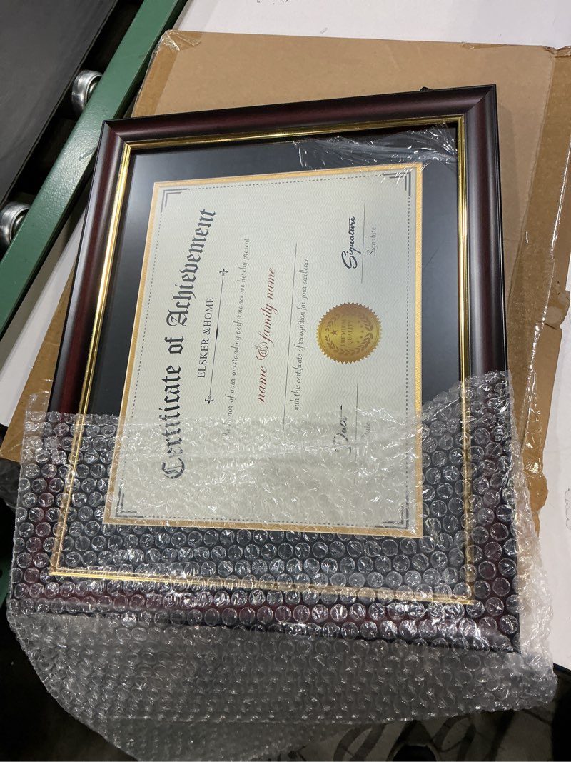 Condition photo showing item condition for Diploma Frames 8.5x11 with Mat or 11x14 without Mat,1 Pack Certificate Document Frame with Real Glass for Wall and Tabletop Display in Walnut(Black/Gold Double Mat) Walnut 11x14(1 Pack)