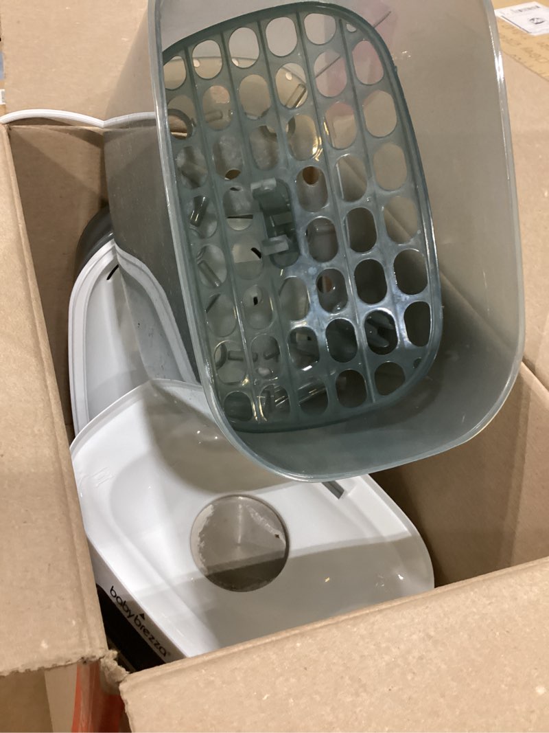 Condition photo showing As Is for baby brezza bottle sterilizer and dryer advanced