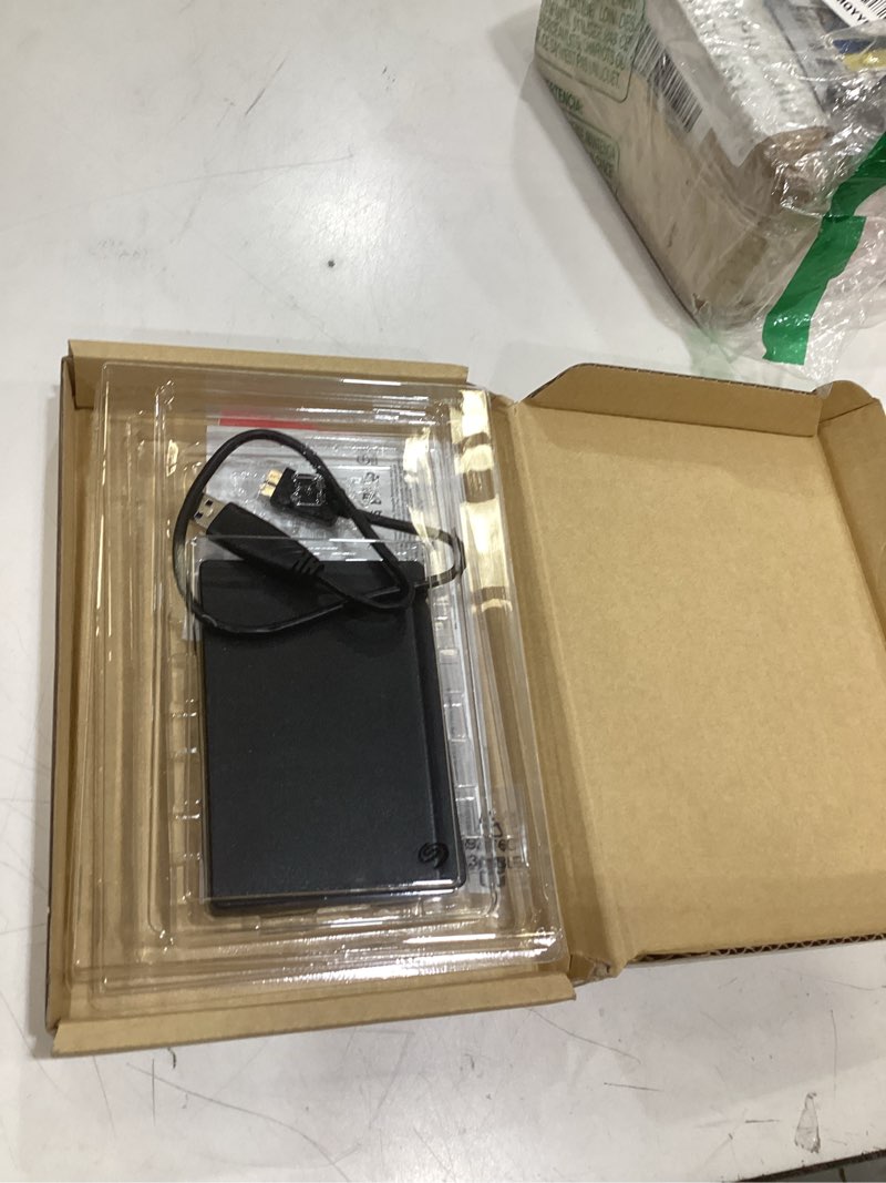 Condition photo showing As Is for seagate portable 2tb external hard drive hdd — usb 3.0 for pc, mac, playstation, & xbox -1-year rescue service (stgx2000400) 2tb portable hdd