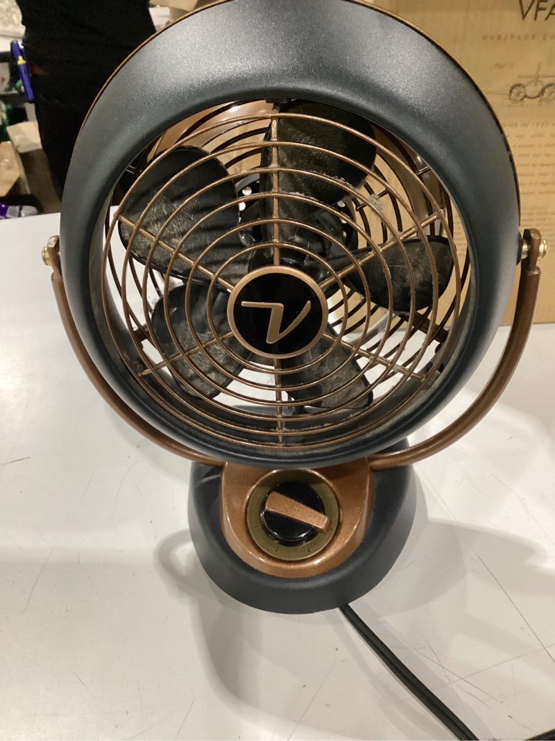 Condition photo showing As Is for used not tested vornado vfan™ petite alchemy vintage air circulator, 3-speed, retro metal, desk fan with adjustable tilt head for bedroom, office, dorm cooling, 12 in compact fan, gunmetal finish vfan alchemy petite fan