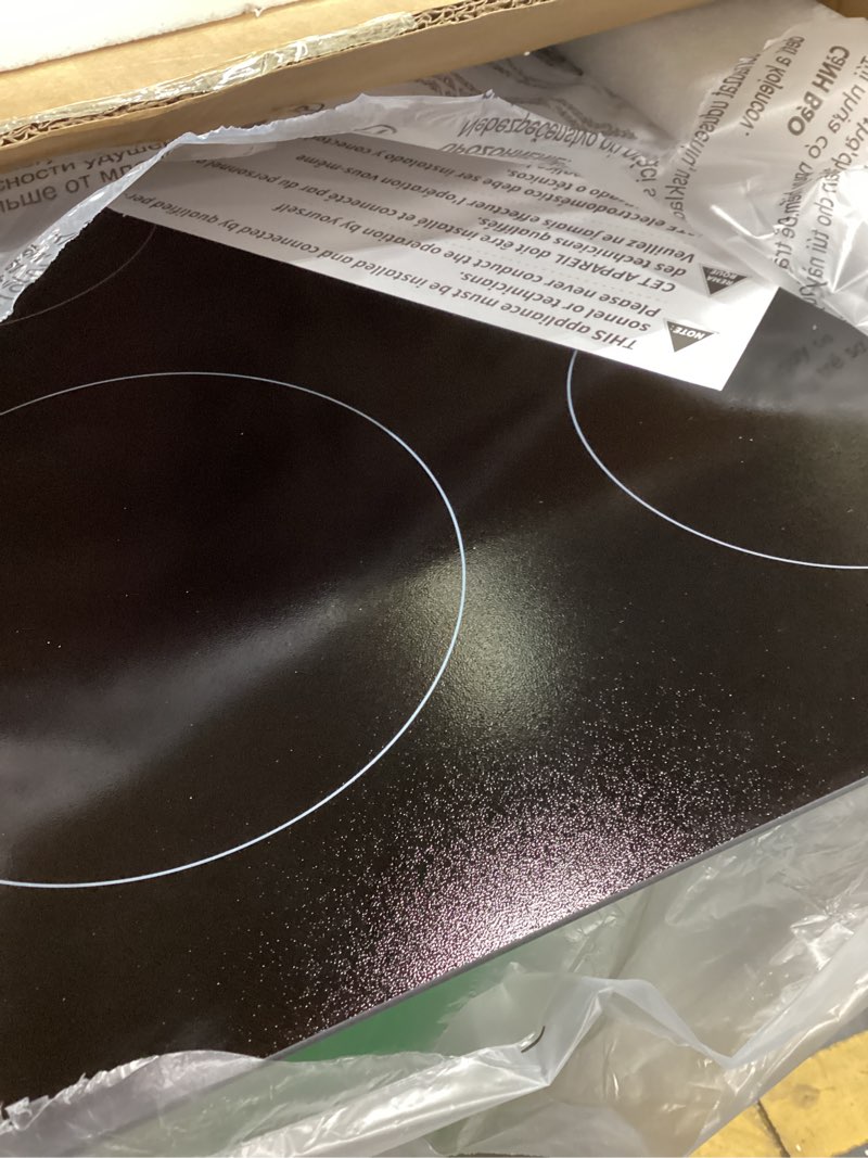 Condition photo showing Good Condition for karinear 4 burner electric cooktop 24 inch, built-in stove top, 220-240v radiant cooktop with knob control, residual heat indicator, over-temperature protection, hard wire(no plug)
