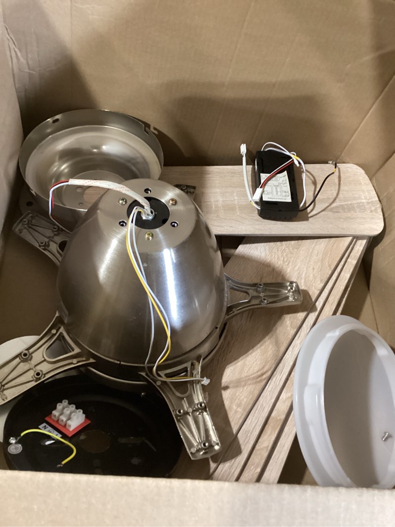  brushed nickel indoor ceiling fan with an integrated LED light kit and a remote control receiver. 