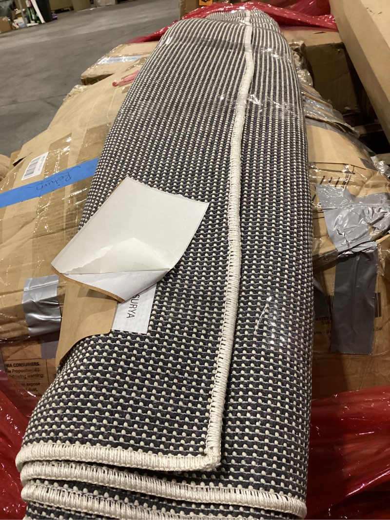 Condition photo showing As Is for Livabliss x Becki Owens Rivi Moroccan Area Rug , 7'10" x 10', Ivory/Black 7'10" x 10' (Rectangular) Ivory/Black