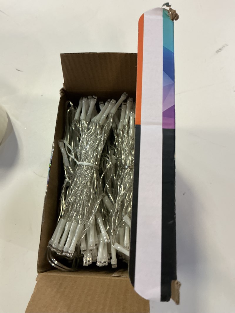 Condition photo showing New/Like New for WATERGLIDE 300 LED Curtain Lights, Remote Control Christmas Decorative Hanging String Lights, 8 Lighting Mode, Plug in for Indoor Outdoor Holiday Party Garden Backdrop Wedding Home Decor, Multicolor