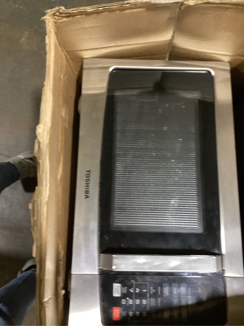 Condition photo showing As Is for **AS IS** TOSHIBA EM131A5C-SS Countertop Microwave Ovens 1.2 Cu Ft with 12.4\" Removable Turntable Smart Humidity Sensor, 12 Auto Menus Mute Function ECO Mode Easy Clean Interior, 1000W, Silver 1.2 Cu.Ft.-Silver