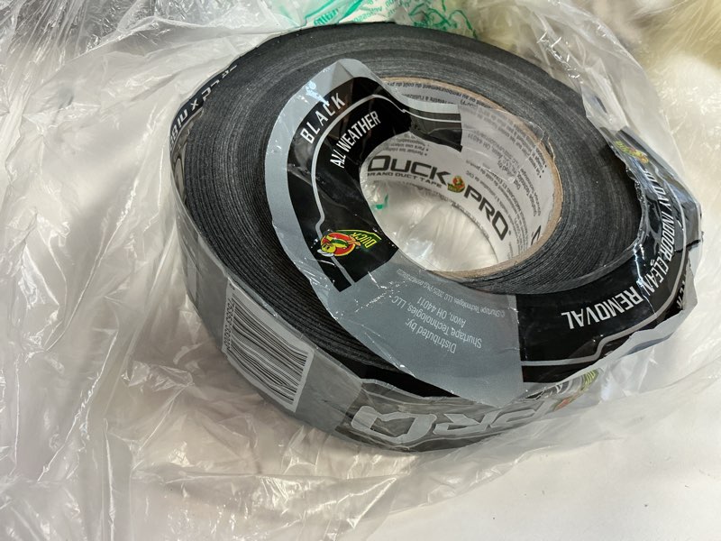 Condition photo showing As Is for Duck Pro Heavy Duty Duct Tape for Long Lasting Repairs, 2" Wide (1.88 in x 55 Yds) Performance Grade Duck Tape with Waterproof Backing, Black, 1 Roll