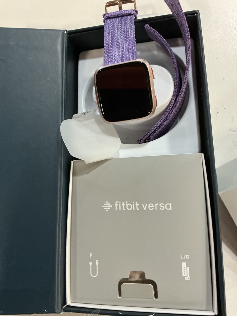 Condition photo showing Good Condition for fitbit versa special edition smart watch, lavender woven, one size (s & l bands included)