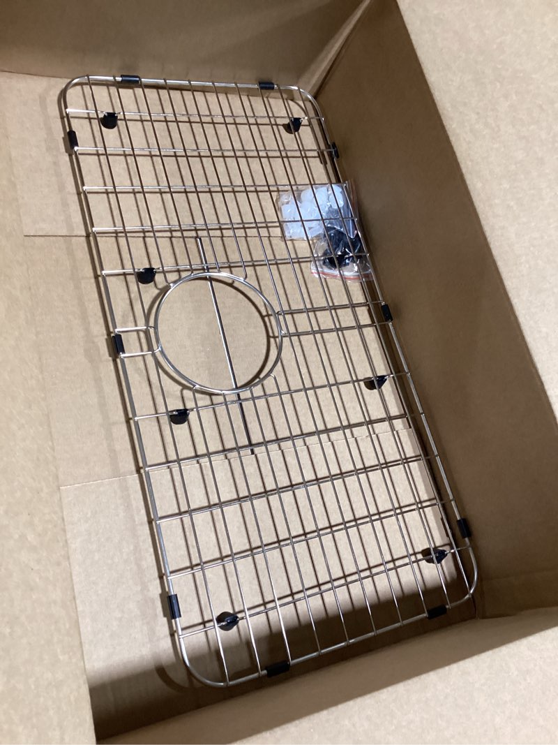 Condition photo showing Good Condition for serene valley 25-1/4" x 12-1/2“ sink grid, rear drain with corner radius 1-1/2", nlw2513r
