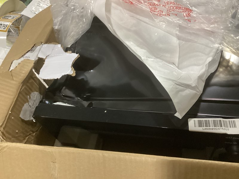 Condition photo showing As Is for Commercial Chef 0.6 Cu. Ft. Countertop Microwave Oven, Mechanical Dial Controls, 700W, Pull Handle Door, 6 Power Levels, CHM660B, Black Black 0.6 Cubic Feet