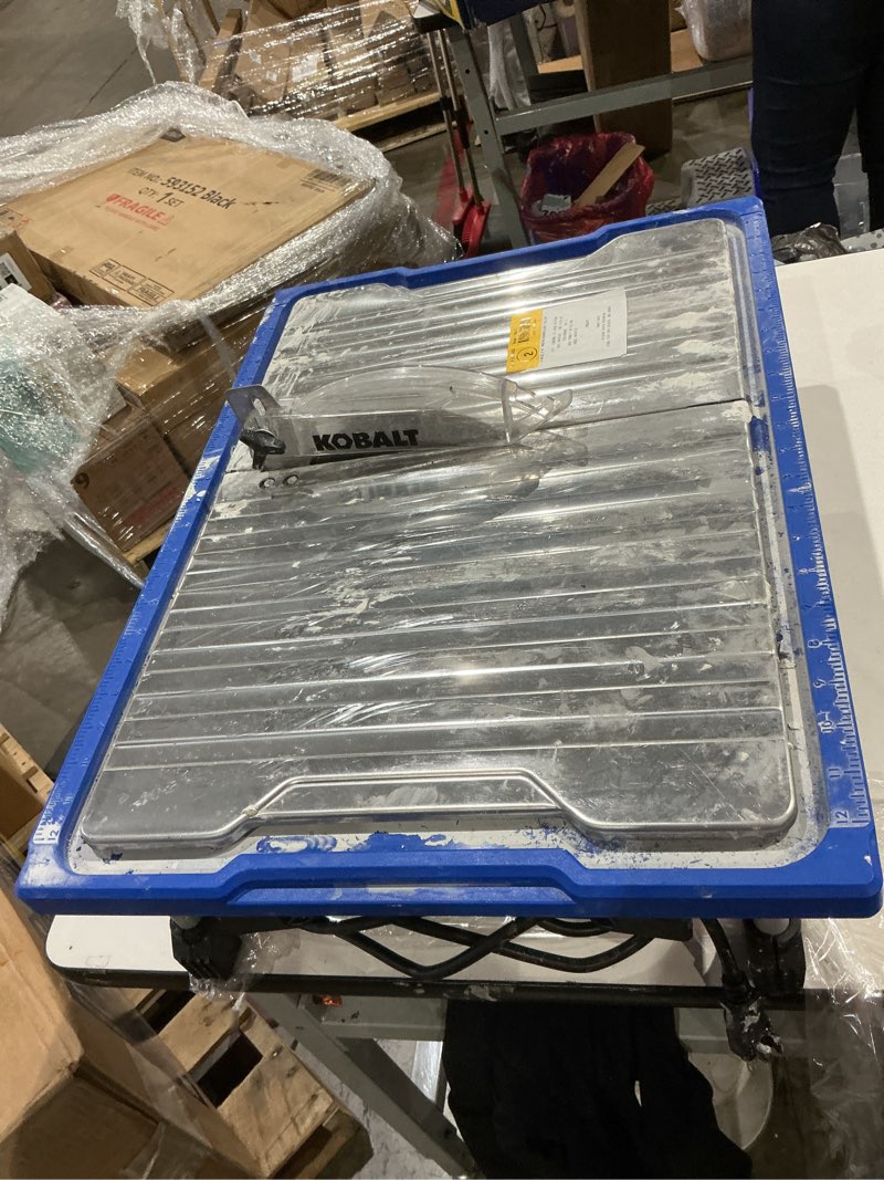 Condition photo showing As Is for kobalt 5 -amp 7-in -blade wet tabletop tile saw item #2590043 | model #kws-b7-20