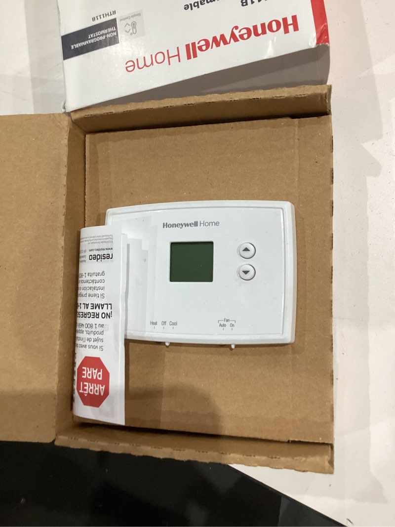 Condition photo showing As Is for honeywell home electronic non-programmable thermostat
