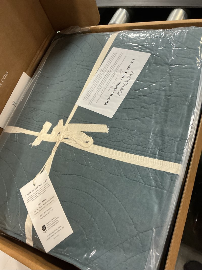 Condition photo showing New/Like New for evergrace 100% cotton scallop quilt set, king size, stormy blue | scalloped border, timeless chic aesthetic, all-season comfort, perfect french country bedroom decor, 3 piece set with 2 shams scallop stormy blue king
