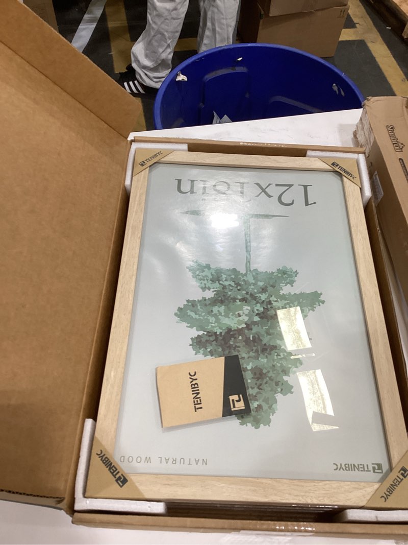 Condition photo showing New/Like New for TENIBYC 12x18 Poster Frame 4 Pack, Textured Natural Solid Wood Picture Frame, HD Tempered Glass, Wall Gallery Photo Frame 4 Pack Natural 12x18