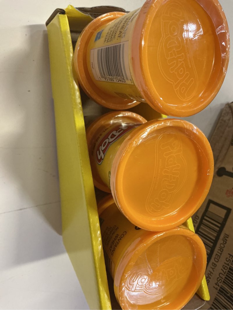 Condition photo showing New/Like New for playdoh (orange) pack of 6