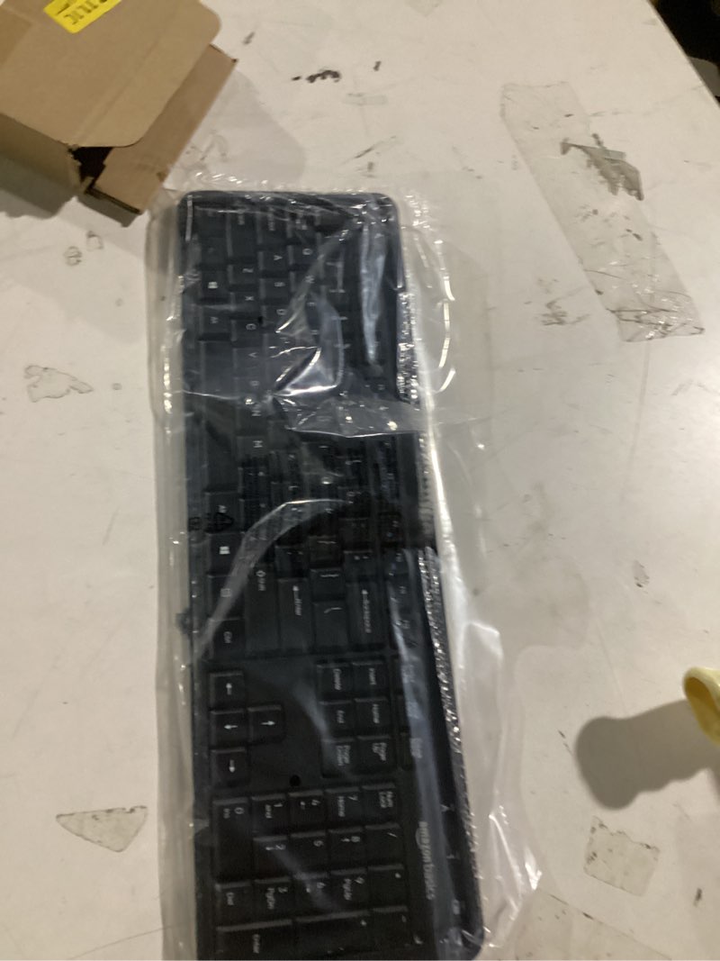 Condition photo showing New/Like New for amazon basics modern wireless keyboard with numeric keypad, compact us layout (qwerty), 2.4ghz, black