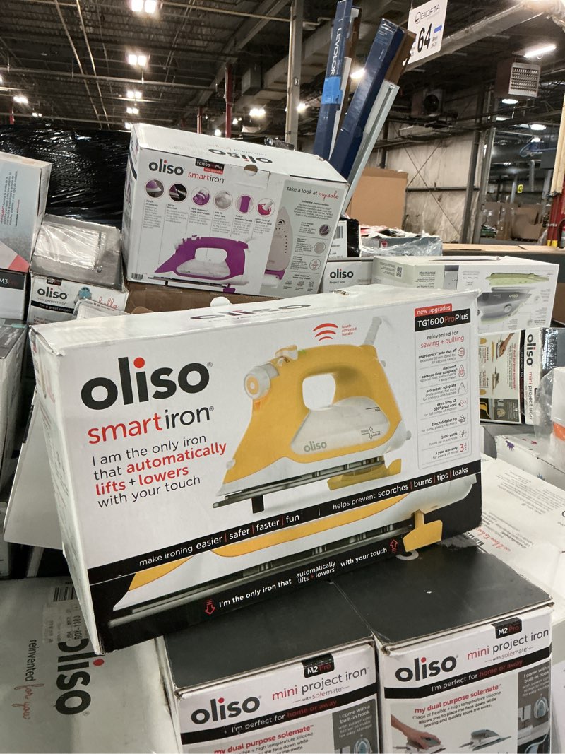 Condition photo showing New/Like New for oliso proplus smart iron yellow: 1800w ceramic soleplate, automatic shut-off, vertical steam, anti-drip, 12.7oz water tank