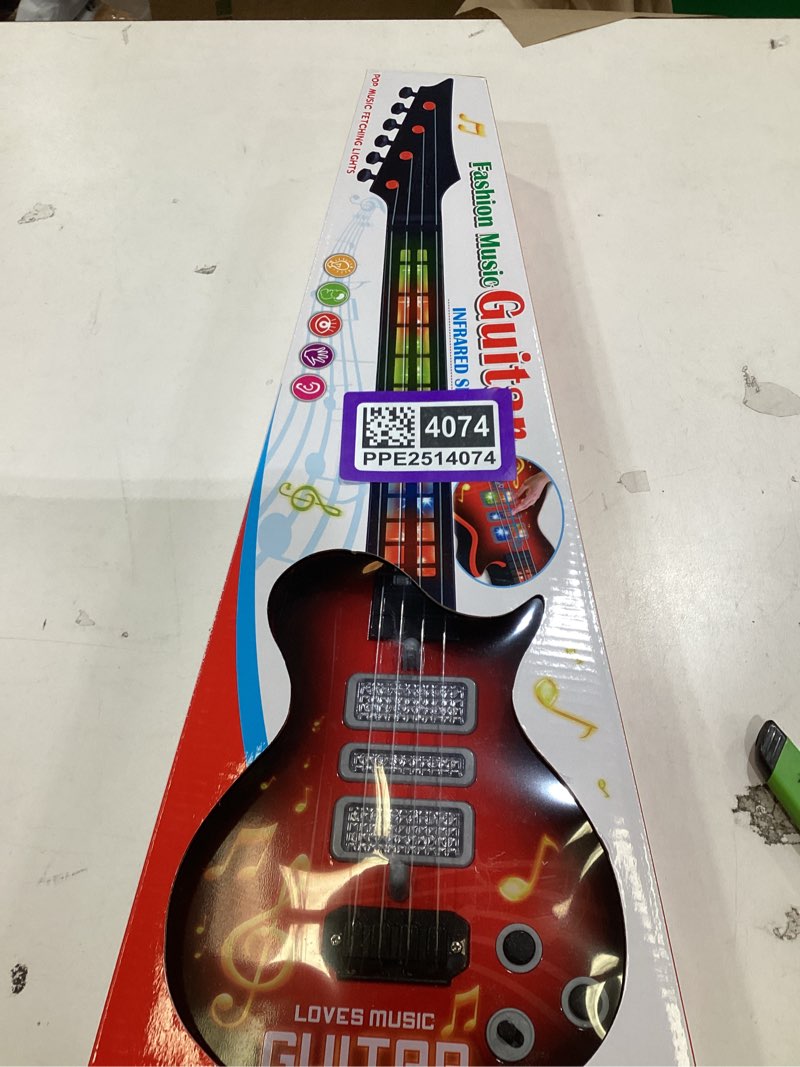Condition photo showing New/Like New for Kids Guitar Toy for 3 Year Old Boy Gift 21 Inches Electric Guitars with 4 Strings for Toddlers Light Up Music Toys for Boys Girls Gifts Ages 3 4 5 (Red)