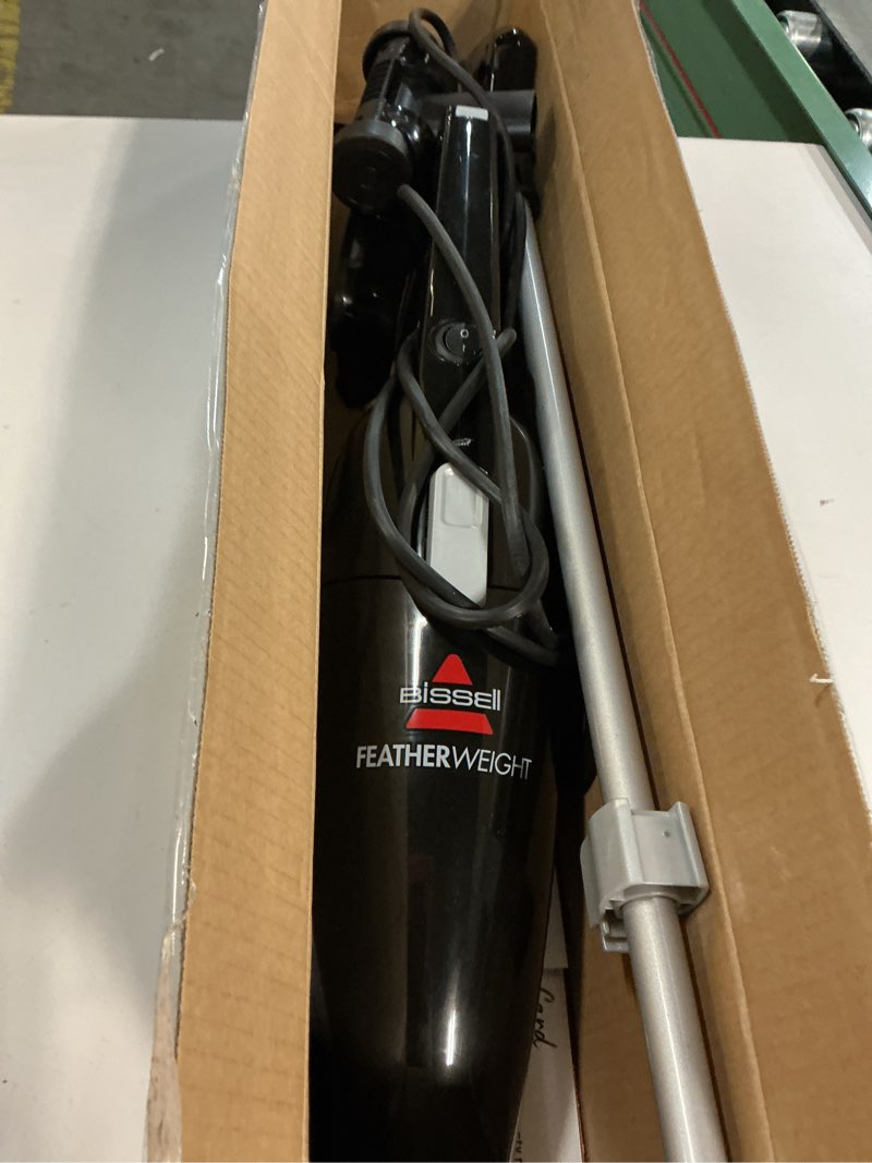 Condition photo showing As Is for Bissell Featherweight Stick Lightweight Bagless Vacuum with Crevice Tool, 2033M, Black Featherweight (Black)