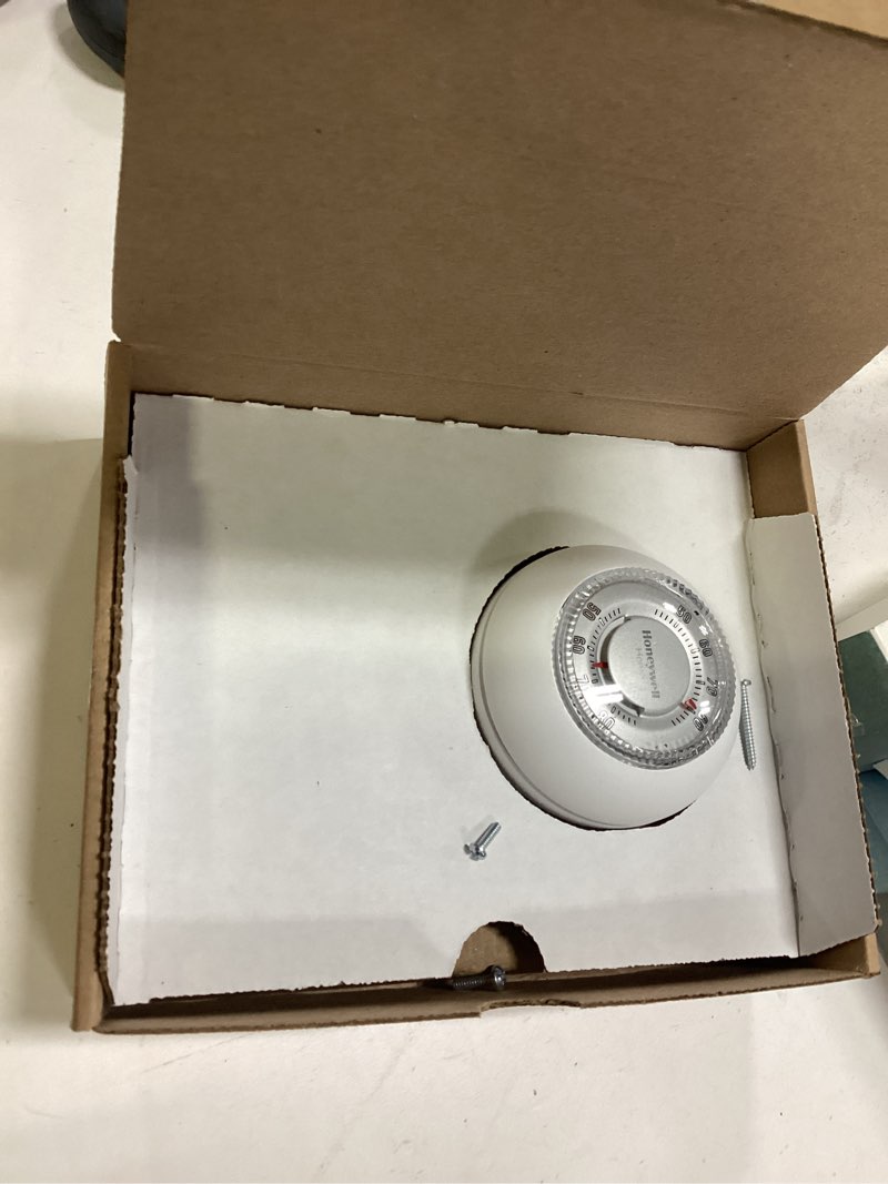 Condition photo showing As Is for Honeywell Home Manual Heat Only Thermostat