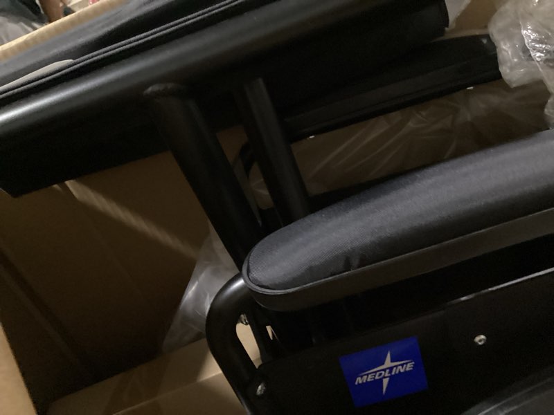 Condition photo showing Good Condition for medline premium ultra-lightweight wheelchair with flip-back desk arms and elevating leg rests for extra comfort, black, 22” w x 18" d seat 22 x 18 inch