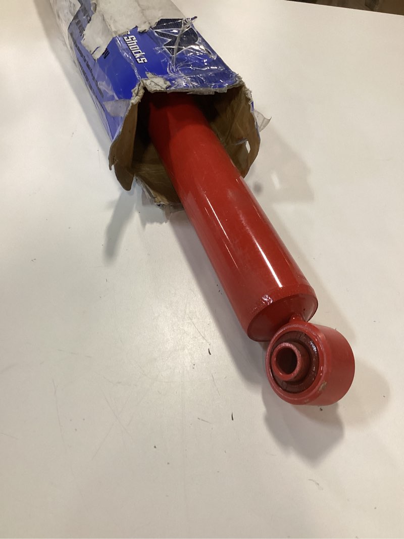 Condition photo showing As Is for KYB 565104 MonoMax Gas Shock, Red