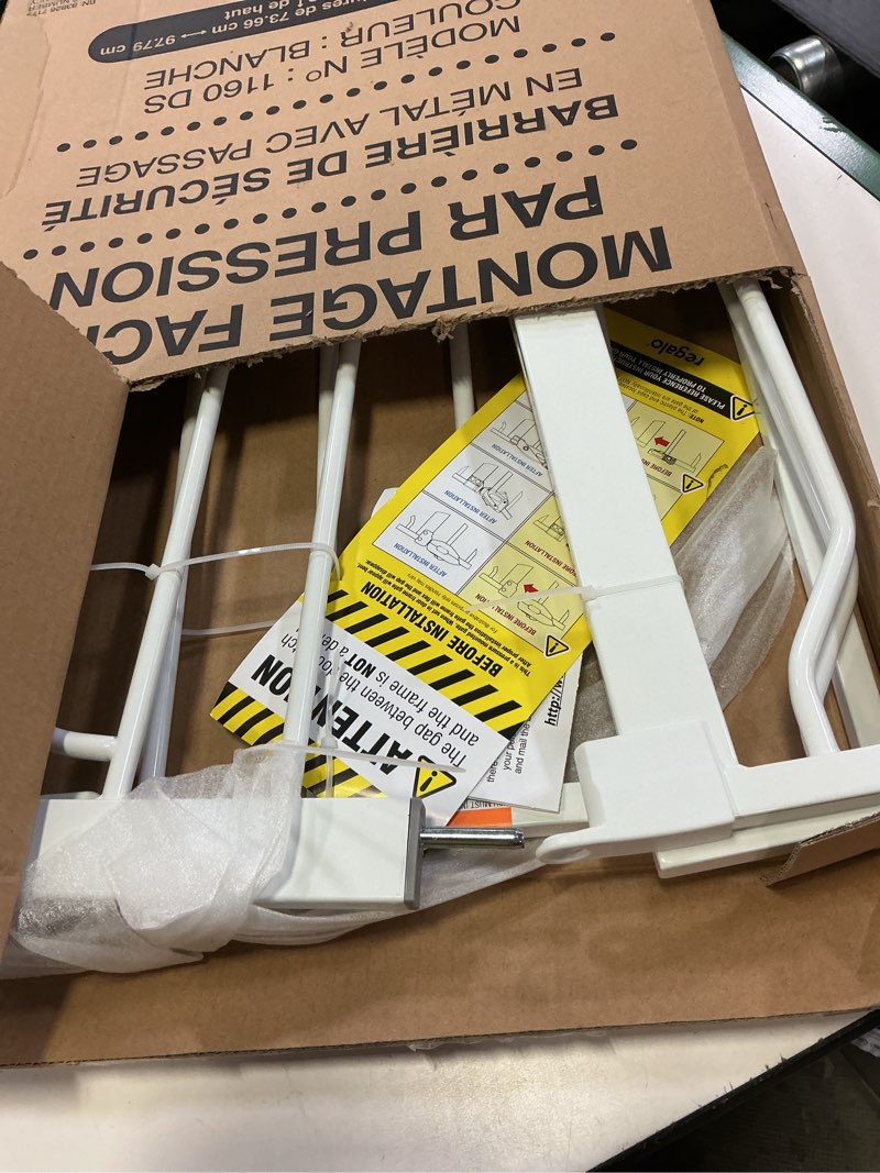 Condition photo showing As Is for regalo safety 38" baby gate for doorways & bottom of stairs, pressure mount design for babies, toddlers & pets, tested & safe for 30 years, american designed, american owned, white white 29-38.5"w x 30"h