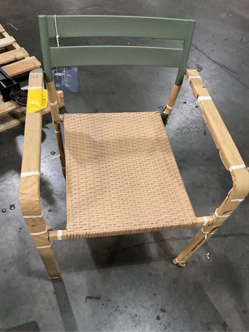 Condition photo showing As Is for  style selections darcy wicker stackable green steel frame stationary dining chair with woven
