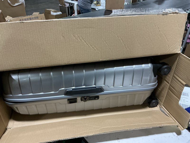 Condition photo showing Good Condition for samsonite proxis x-large hardside luggage with dual spinner wheels - innovative roxkin™ lightweight shell with ultimate durability- includes tsa lock, ergonomic telescoping handle -silver x large spinner silver