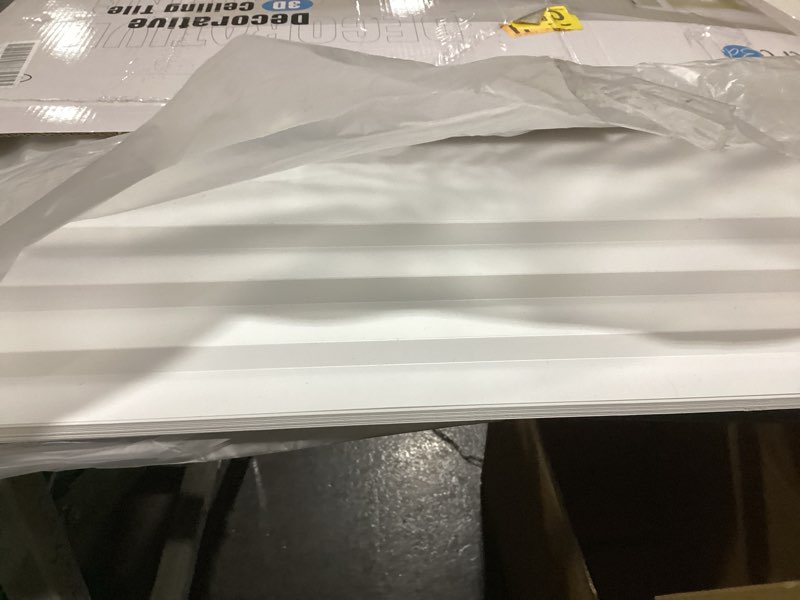 Condition photo showing As Is for Art3d 12-Pack 24×24 Inch PVC Waterproof Drop Ceiling Tiles for Home Décor - 2x2 ft 3D Modern Ceiling Panel for Suspended Grid, White 24"x24" White 12