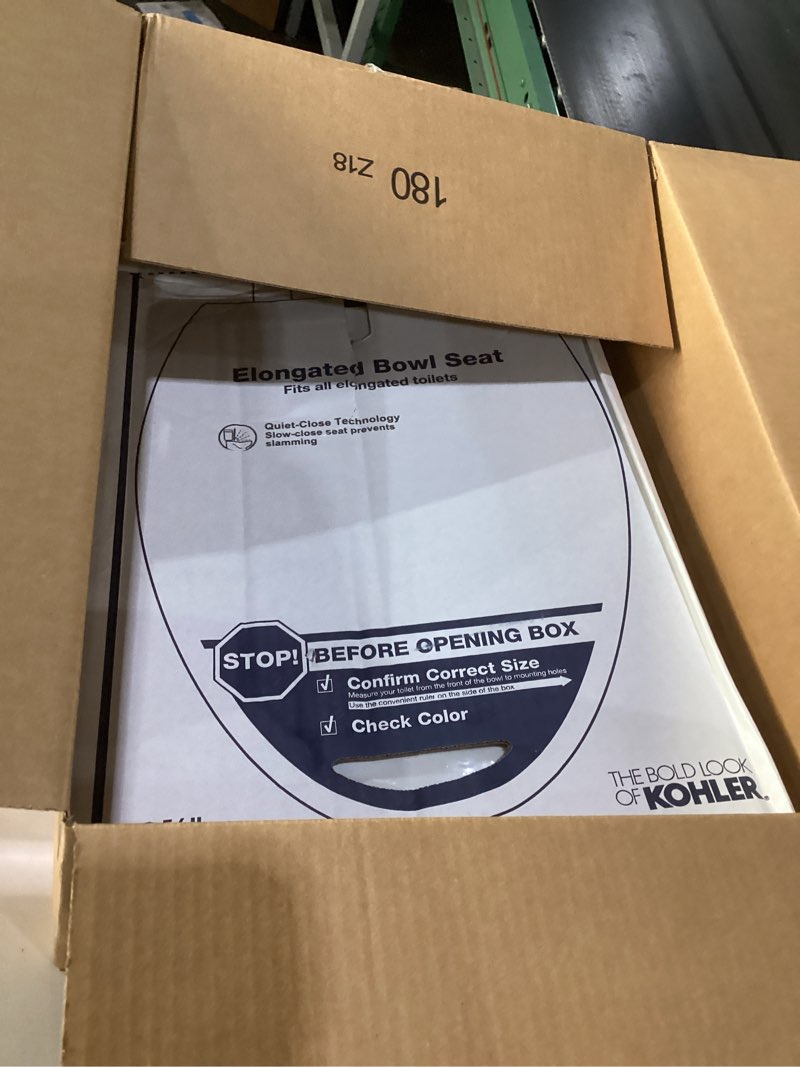 Condition photo showing As Is for Kohler K-20110-0 Brevia Elongated Toilet Seat with Grip-Tight Bumpers, Quiet-Close Seat, Quick-Attach Hardware, White