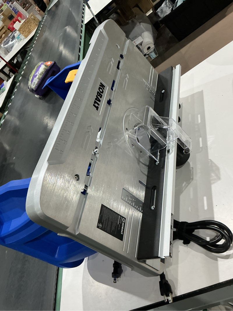 Condition photo showing As Is for kobalt 1/4-in and 1/2-in 12 -amp 2 -hp variable speed fixed router