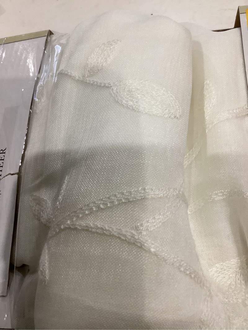 Condition photo showing Good Condition for allen + roth 84-in ivory sheer rod pocket single curtain panel