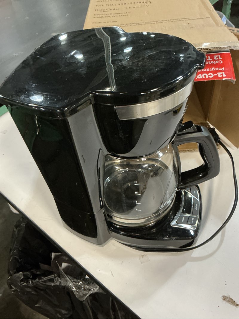Condition photo showing As Is for BLACK+DECKER 12-Cup Digital Coffee Maker, Programmable, Washable Basket Filter, Sneak-A-Cup, Auto Brew, Water Window, Keep Hot Plate, Black Black coffeemaker