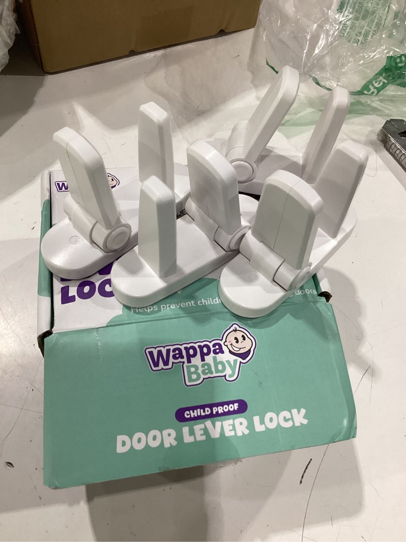 Condition photo showing As Is for 2-4packs, 8 total, door lever locks (4 pack) - prevents toddlers from opening doors - durable abs with 3m adhesive - easy one-hand operation for adults, no tools needed white 4