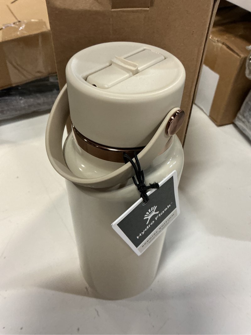 Condition photo showing Good Condition for hydro flask water bottle - insulated stainless steel - wide mouth flex straw lid, non spill, leakproof and refillable in 32 oz linen rose gold