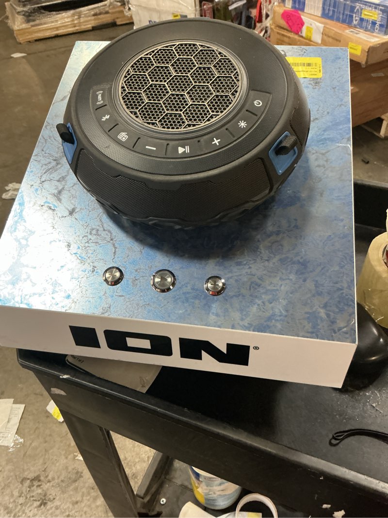 Condition photo showing As Is for bt floating speaker with lights 
