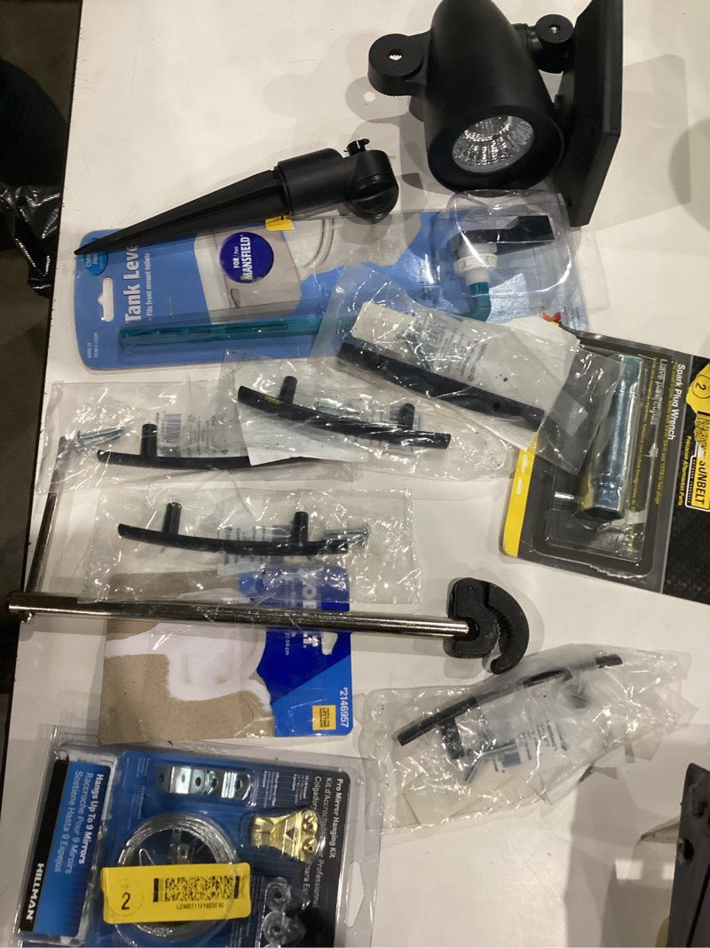 Condition photo showing As Is for assorted home improvement lot (small tools, screw, home accessories, etc.)