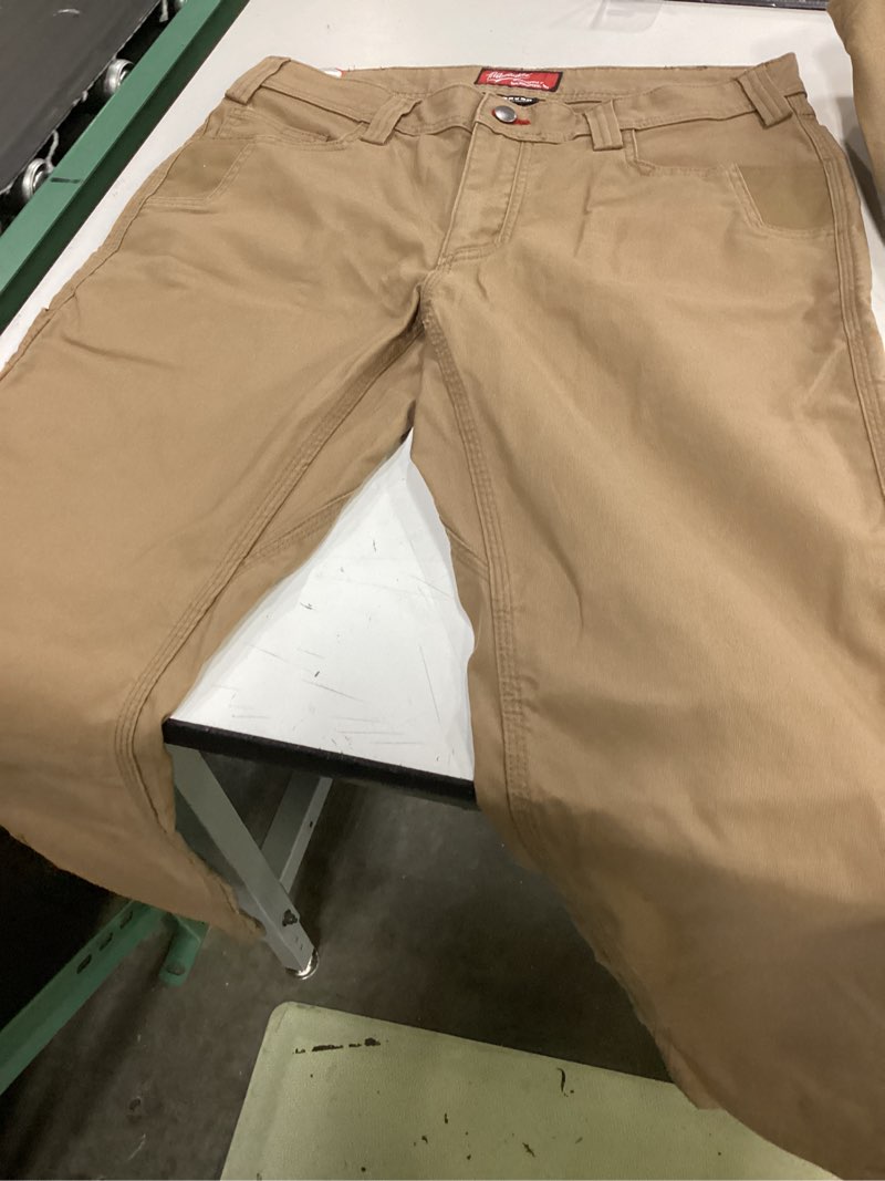 Condition photo showing New/Like New for men's 32 in. x 30 in. khaki cotton/polyester work pants with 7 pockets