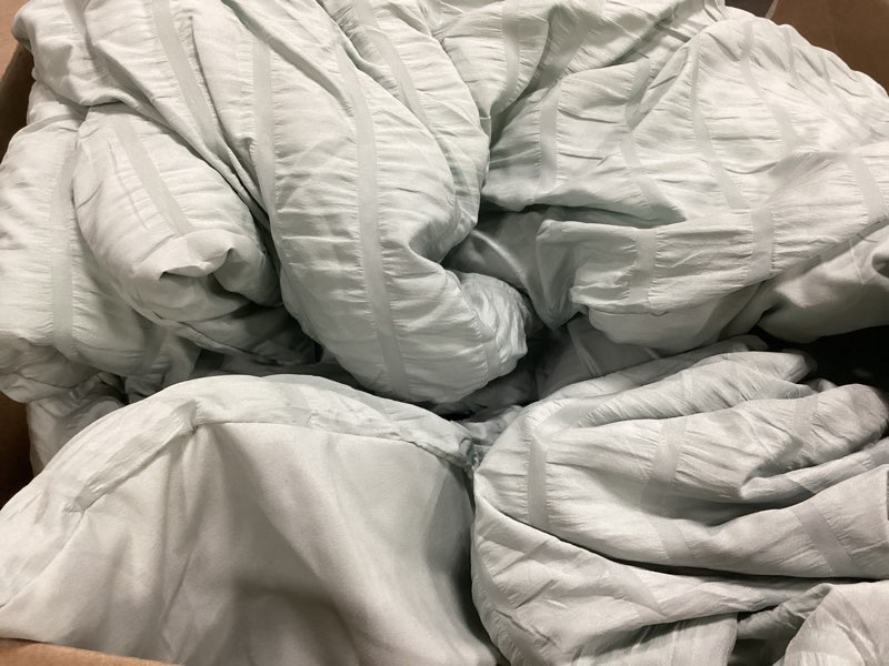 Condition photo showing As Is for Sagegreen California King Comforter Set - 3 Pieces Seersucker Lightweight Bedding Comforter Sets (1 Soft Fluffy Comforter & 2 Pillowcases) - All Seasons Cozy Modern Bed Sets for Women Men 11sagegreen Cal King (104''*96'')