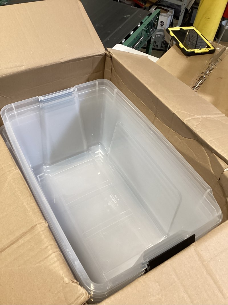 Condition photo showing As Is for iris usa 94 qt stackable plastic storage bins with lids, 4 pack - bpa-free, made in usa - see-through organizing solution, latches, durable nestable containers, secure pull handle - clear 94 qt 4 pack
