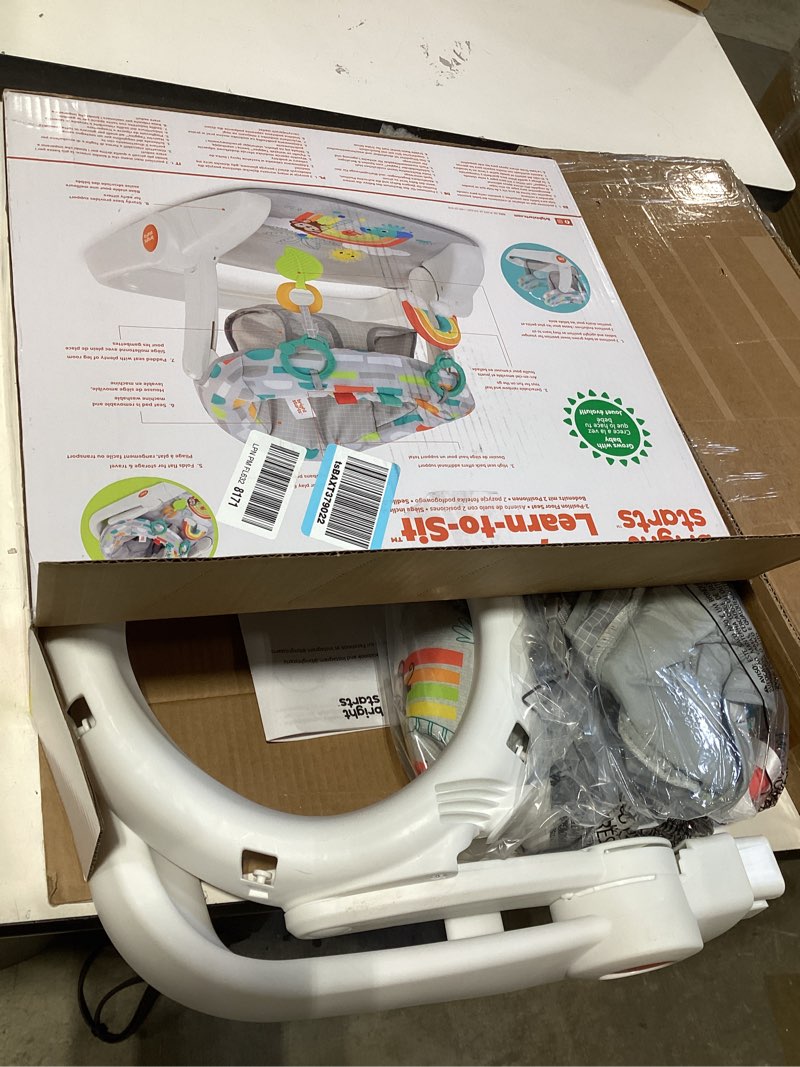 Condition photo showing New/Like New for bright starts learn-to-sit baby floor seat, 2-positions grow with infant, portable baby chair, includes sensory toys, unisex, 4-12 months, playful paradise multicolored