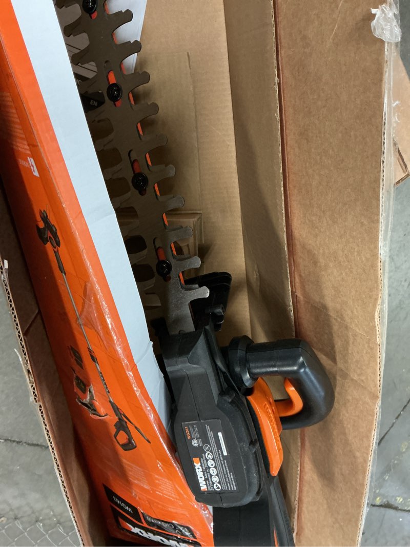 Condition photo showing As Is for worx wg261 20 volt power share cordless battery 22 inch hedge trimmer, orange