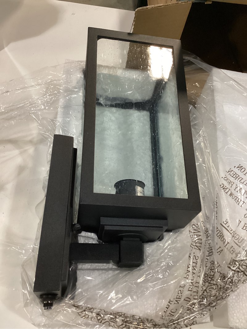Condition photo showing Good Condition for vianis dusk to dawn outdoor porch lights wall mount, modern black exterior lighting fixtures for house, anti-rust aluminium waterproof outdoor wall sconce lantern for garage with tempered seeded glass black standard dusk to dawn 1-pack