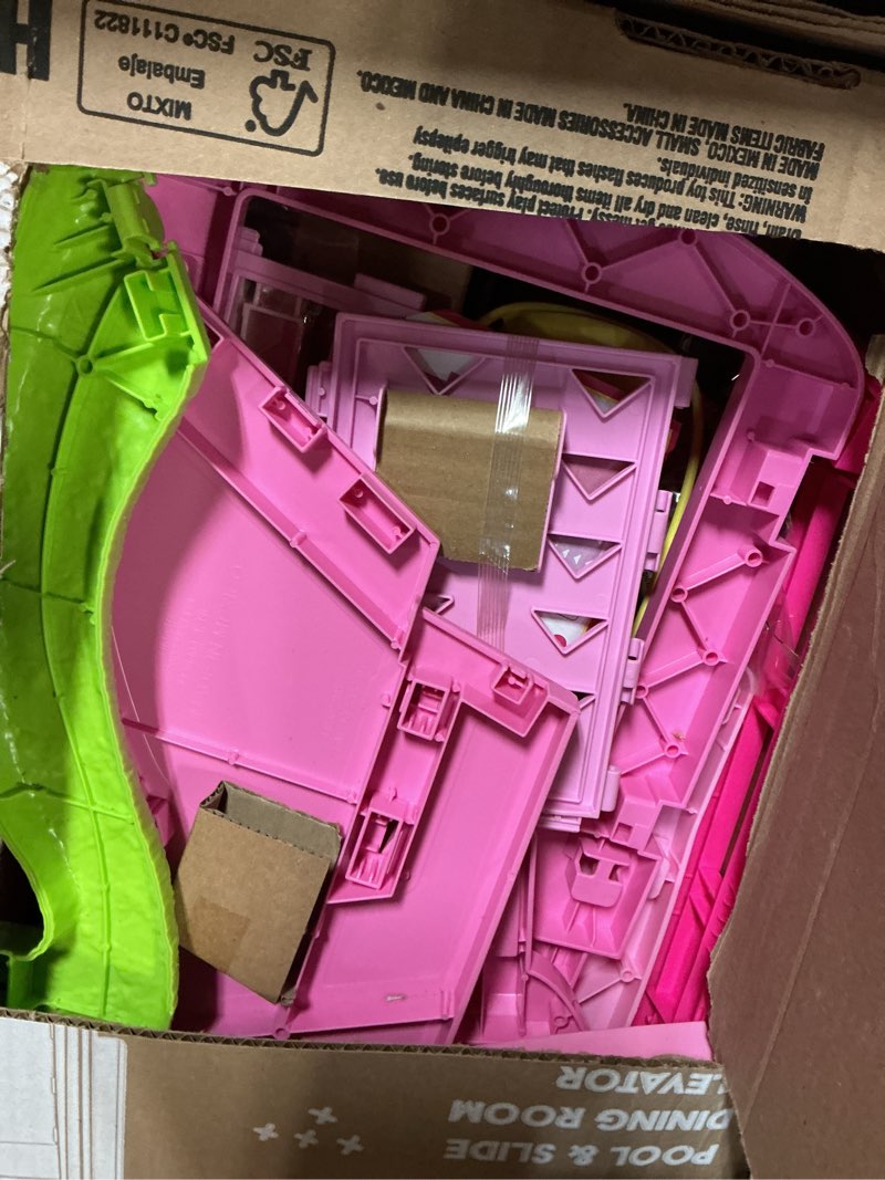 Condition photo showing As Is for barbie dreamhouse, pool party doll house with 75+ pieces and 3-story slide, house playset, pet elevator and puppy play areas