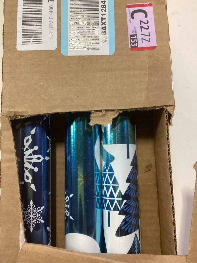 Condition photo showing New/Like New for Hallmark Blue Foil Christmas Wrapping Paper with Cut Lines on Reverse (3 Rolls: 60 sq. ft. ttl) Snowmen, Snowflakes, Christmas Trees Blue Snowman, Snowflakes, Trees
