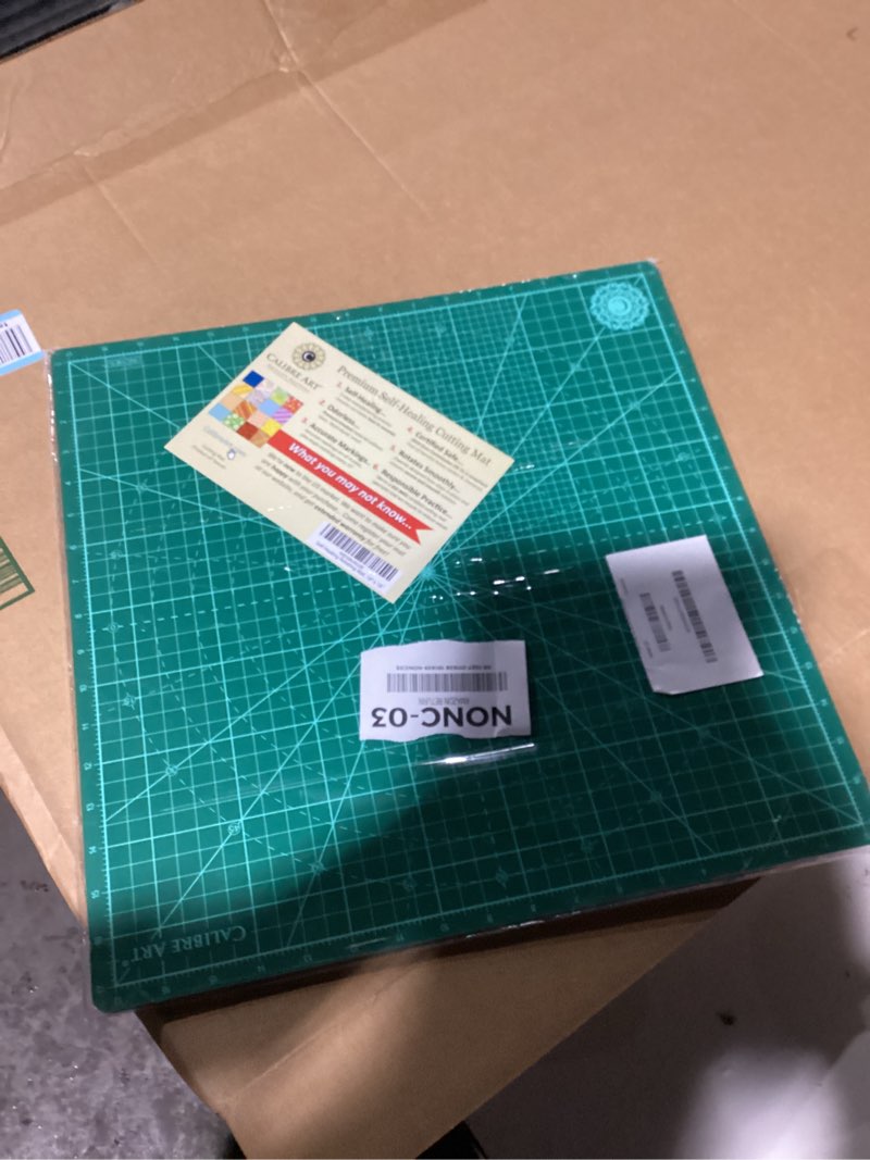 Condition photo showing Good Condition for Calibre Art Self Healing Rotating Cutting Mat 18x18 (17" Grid), Perfect for Quilting & Art Projects