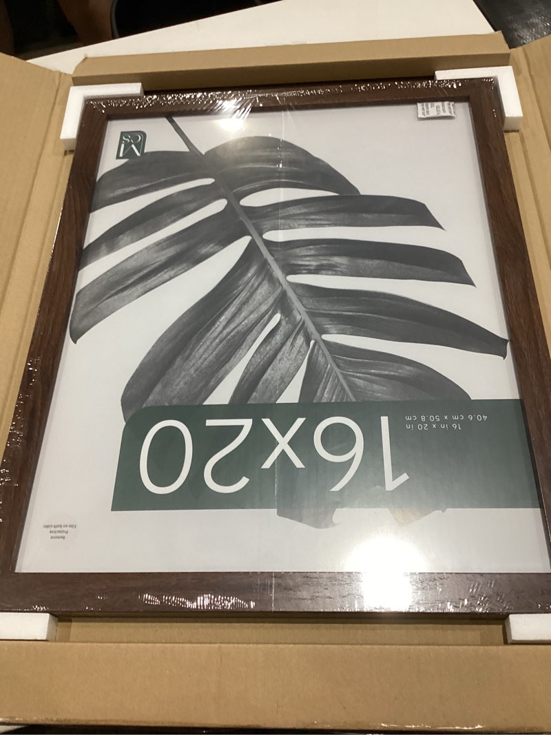 Condition photo showing Good Condition for mcs studio gallery 16x20 poster frame walnut woodgrain, vertical & horizontal wall hanging large picture frame for photos, posters & art prints (1-pack)