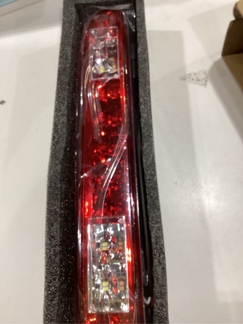 Condition photo showing Good Condition for Partsam High Mount Stop Light Third 3rd Brake Light Replacement for F250 F350 F450 F550 Super Duty 1999 to 2016 / Ranger/B series LED Rear Cab Roof Center Mount Brake Stop Tail Cargo Light Lamp (Red) Red Lens