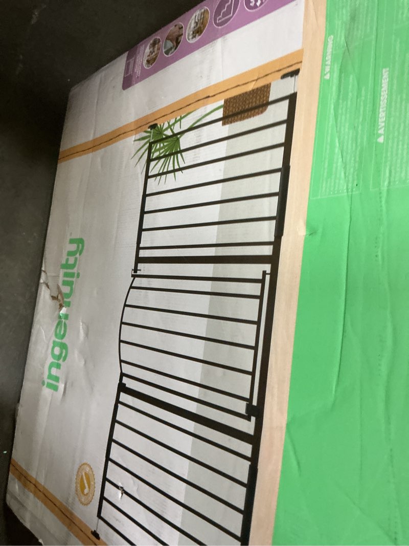 Condition photo showing New/Like New for ingenuity decorative extra wide baby gate & dog gate, 44"-72" wide, 36" tall, hardware or pressure mounted, install in hallways, bottom of stairs, or large openings - bronze